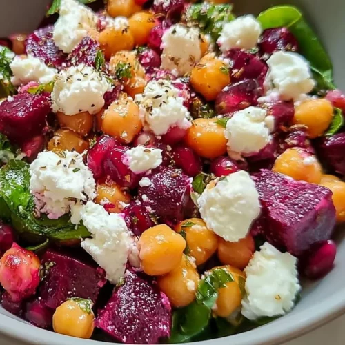 entrée Chickpea Beet Feta Salad with Lemon-Garlic Vinaigrette in a bowl